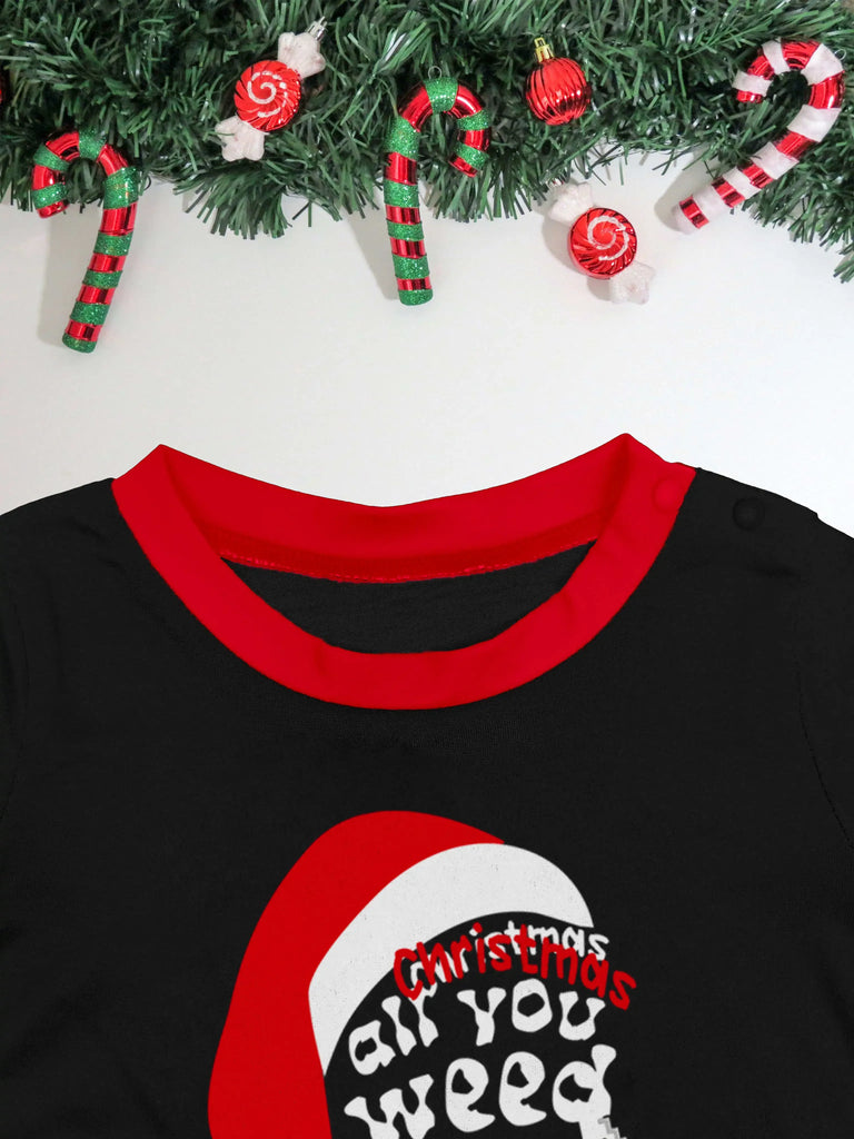 Soft pyjamas with Santa hat print for family lounging
